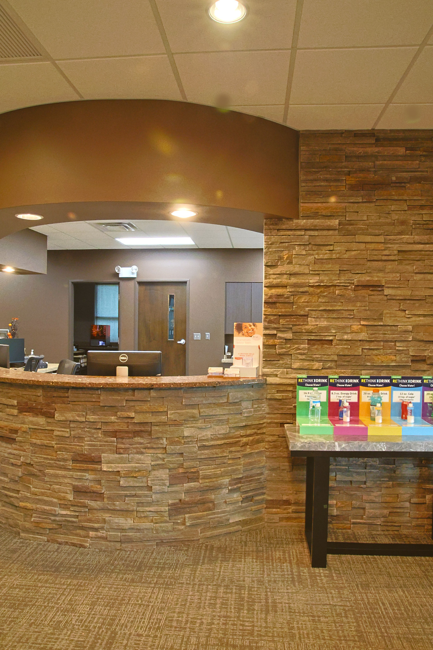 Front desk with natural stone wall
