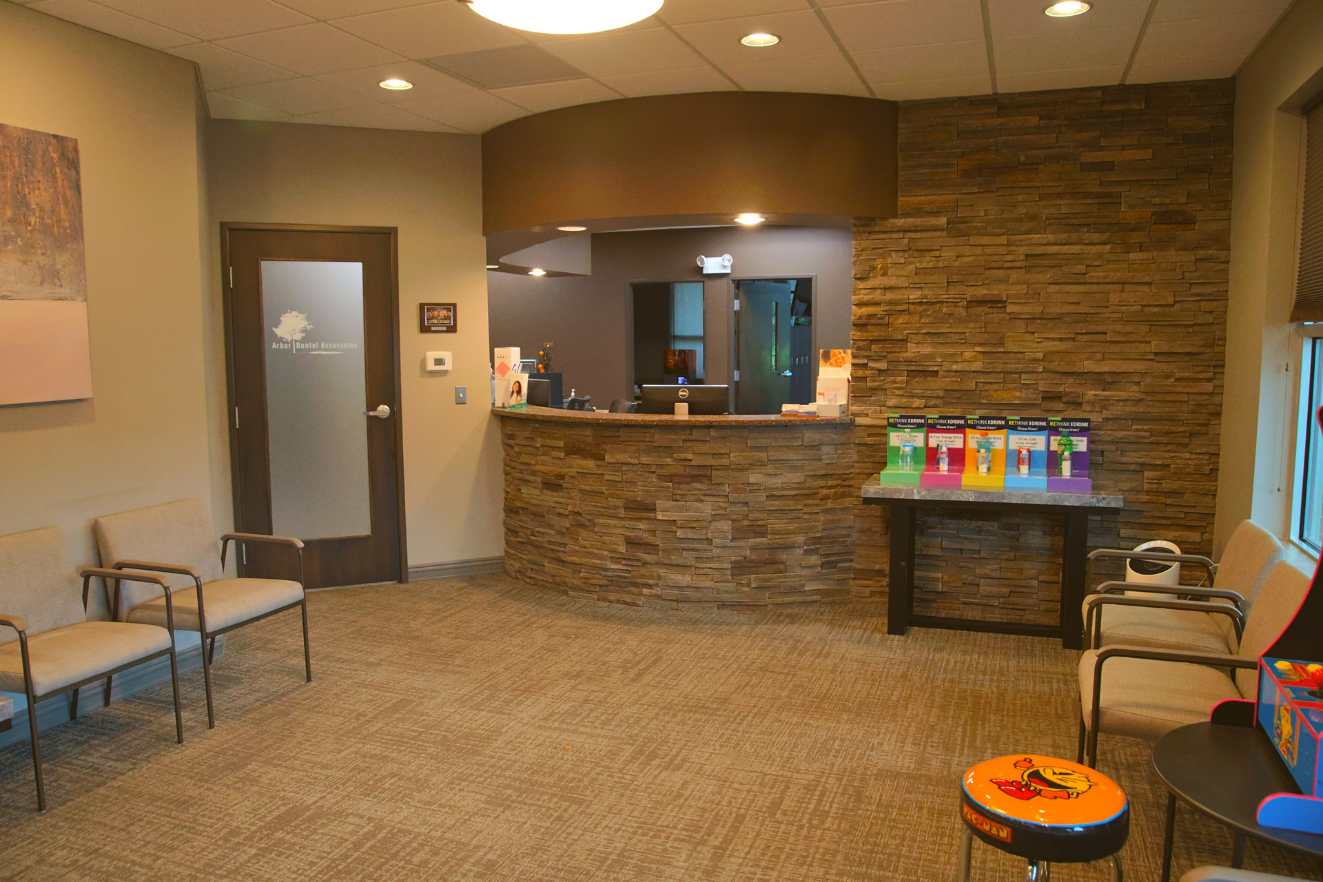 Warm reception lounge with stone feature wall