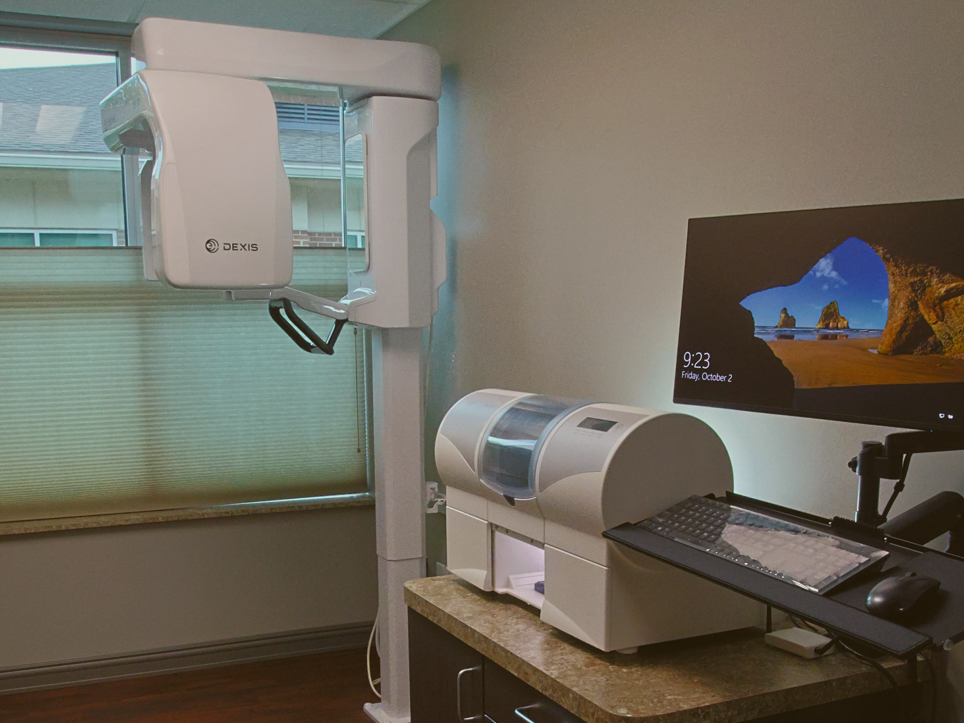 Digital X-ray arm and in-office milling station